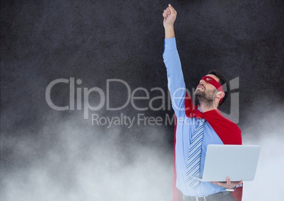 Business Superhero against stone wall with clouds