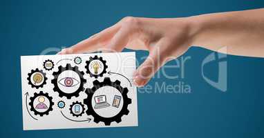 Hand with card and gear graphics against blue background