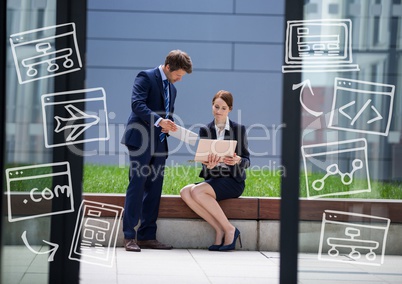 Two business people outside with white business doodles
