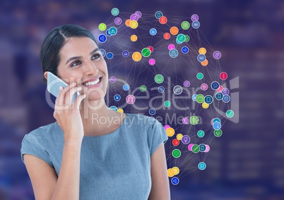 Woman on phone against Night city with connectors