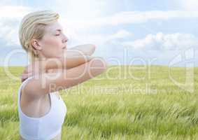 Woman meditative calm relaxing by nature field