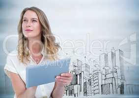 Woman with tablet against buildings sketch and grey wood panel