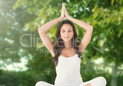 Woman Meditating yoga by trees