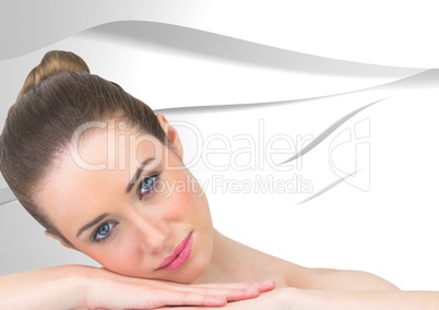 Woman leaning on hands against white texture