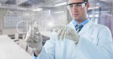 Man in lab coat with glass device and white graph with flare against blurry lab