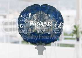 Blue brain with white business doodles against blurry office