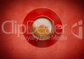 Coffee cup against red background