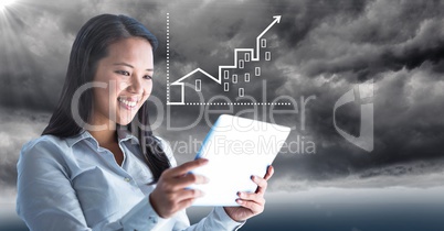 Woman behind flare with tablet and white house graph against stormy sky