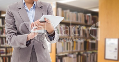 Woman on tablet in Library