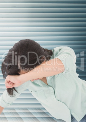 Grief distressed woman against blue background