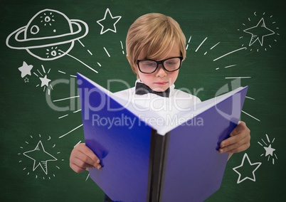 Kid with large book and white space doodles against green chalkboard