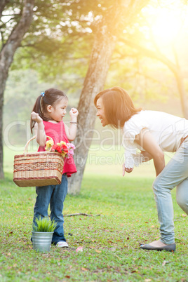 Mother and daughter lifestyle in nature park.