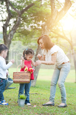 Mother and children lifestyle in nature park.