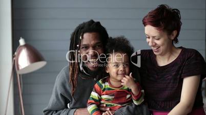 Portrait of beautiful mixed race family smiling