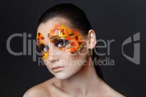 Orange and Red Rhinestones on a Girl Face