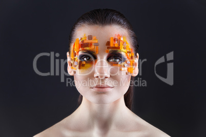 Orange and Red Rhinestones on a Girl Face