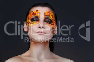 Orange and Red Rhinestones on a Girl Face