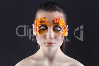 Orange and Red Rhinestones on a Girl Face