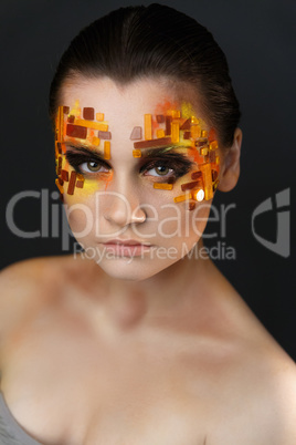 Orange and Red Rhinestones on a Girl Face