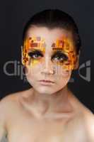 Orange and Red Rhinestones on a Girl Face