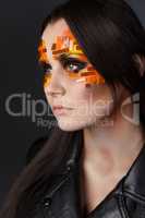 Orange and Red Rhinestones on a Girl Face