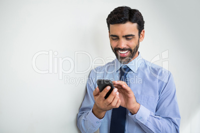 Businessman using mobile phone