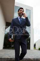 Businessman talking on mobile phone