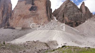 Group of Tourists on the Side of a Big Mountain. Fast Motion