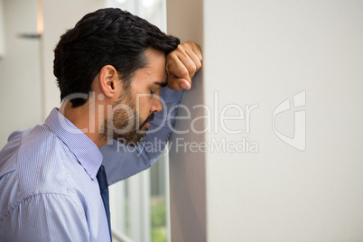 Stressed businessman at conference centre