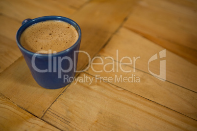 Coffee cup on table in cafeteria