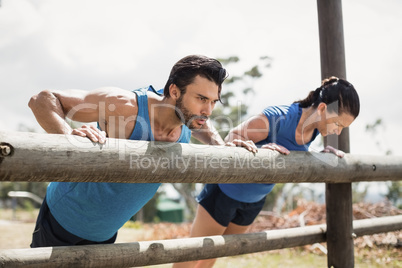 Fit people performing pushup exercise