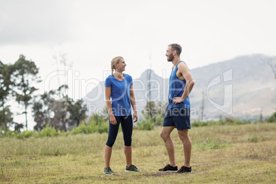 Fit people having a conversation