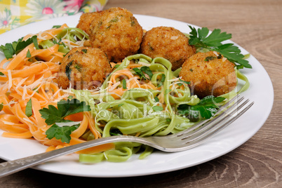 Spaghetti with cheese and meatballs