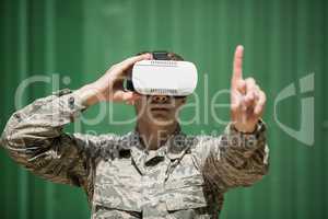 Military soldier using virtual reality headset