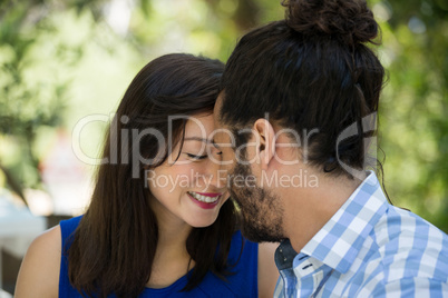 Romantic couple spending leisure time in park