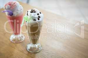 Glasses of milkshake in coffee shop