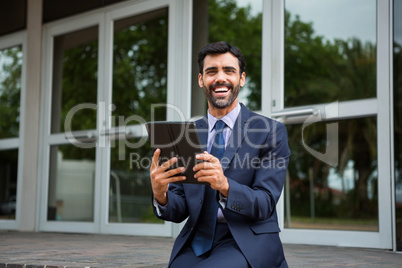 Businessman using digital tablet