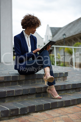 Businesswoman using digital tablet