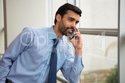 Businessman talking on mobile phone