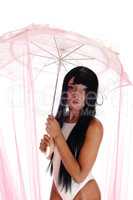 Closeup of woman in bathing suit and umbrella.