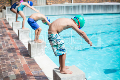 Little swimmers ready to jump in pool