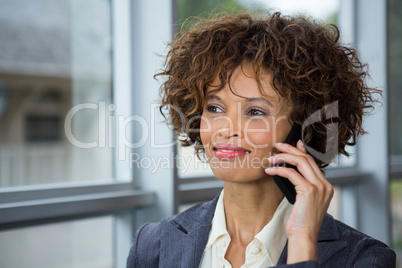 Businesswoman talking on mobile phone