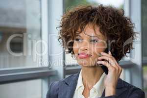 Businesswoman talking on mobile phone