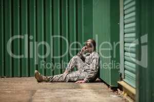 Military soldier talking on mobile phone