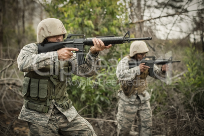 Military soldiers during training exercise with weapon