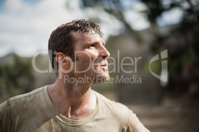 Military man standing during obstacle course