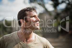 Military man standing during obstacle course