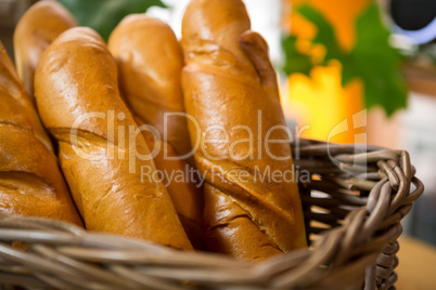 Fresh baked bread loaves in wicker basket