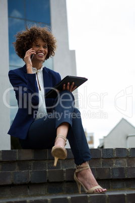 Businesswoman talking on mobile phone