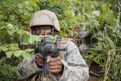 Military soldiers during training exercise with weapon